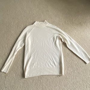 White fuzzy turtleneck sweater